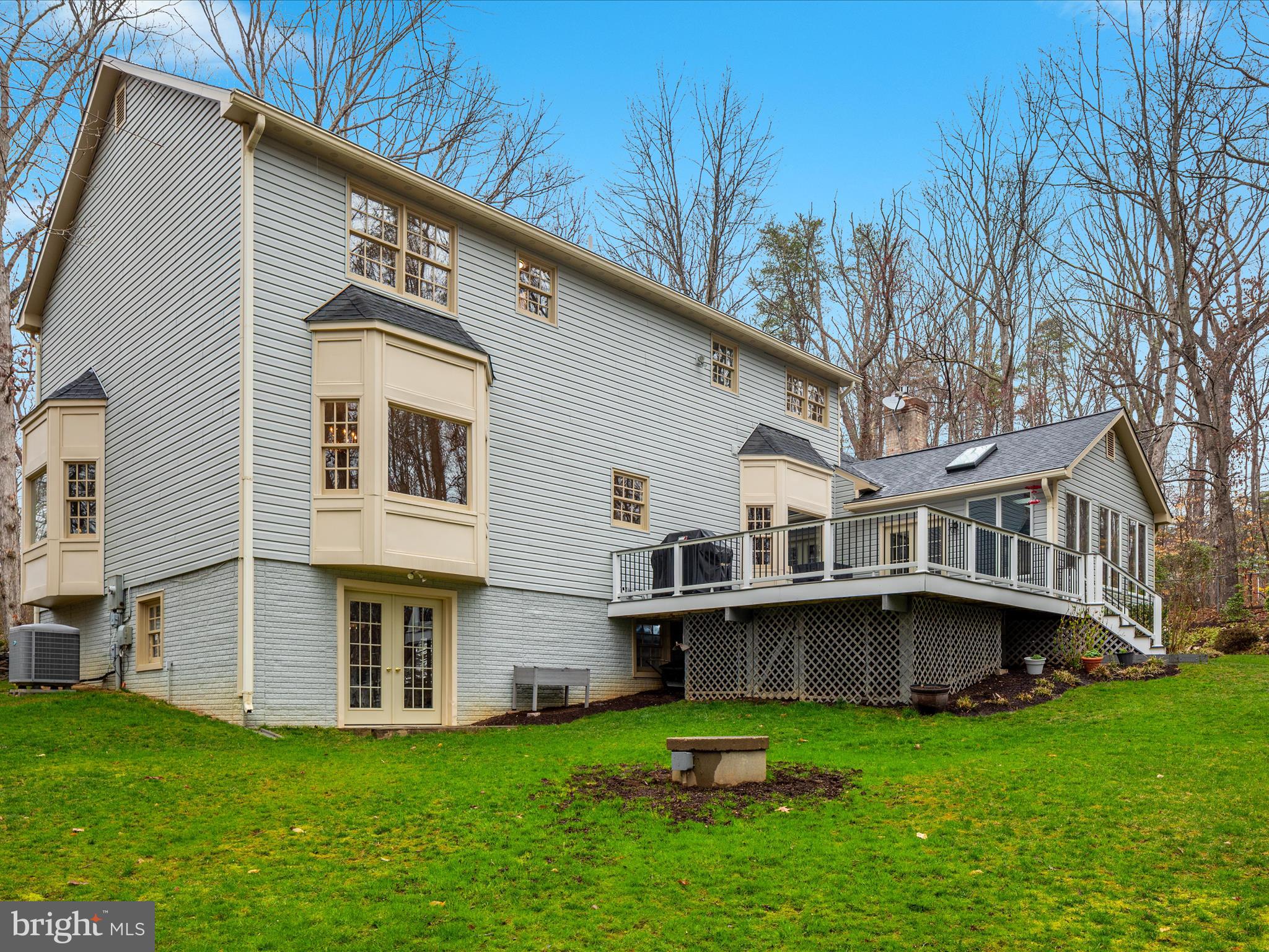 11701 Henderson Road Clifton, VA 20124 - Photo 41 of 61 a front view of a house with a garden