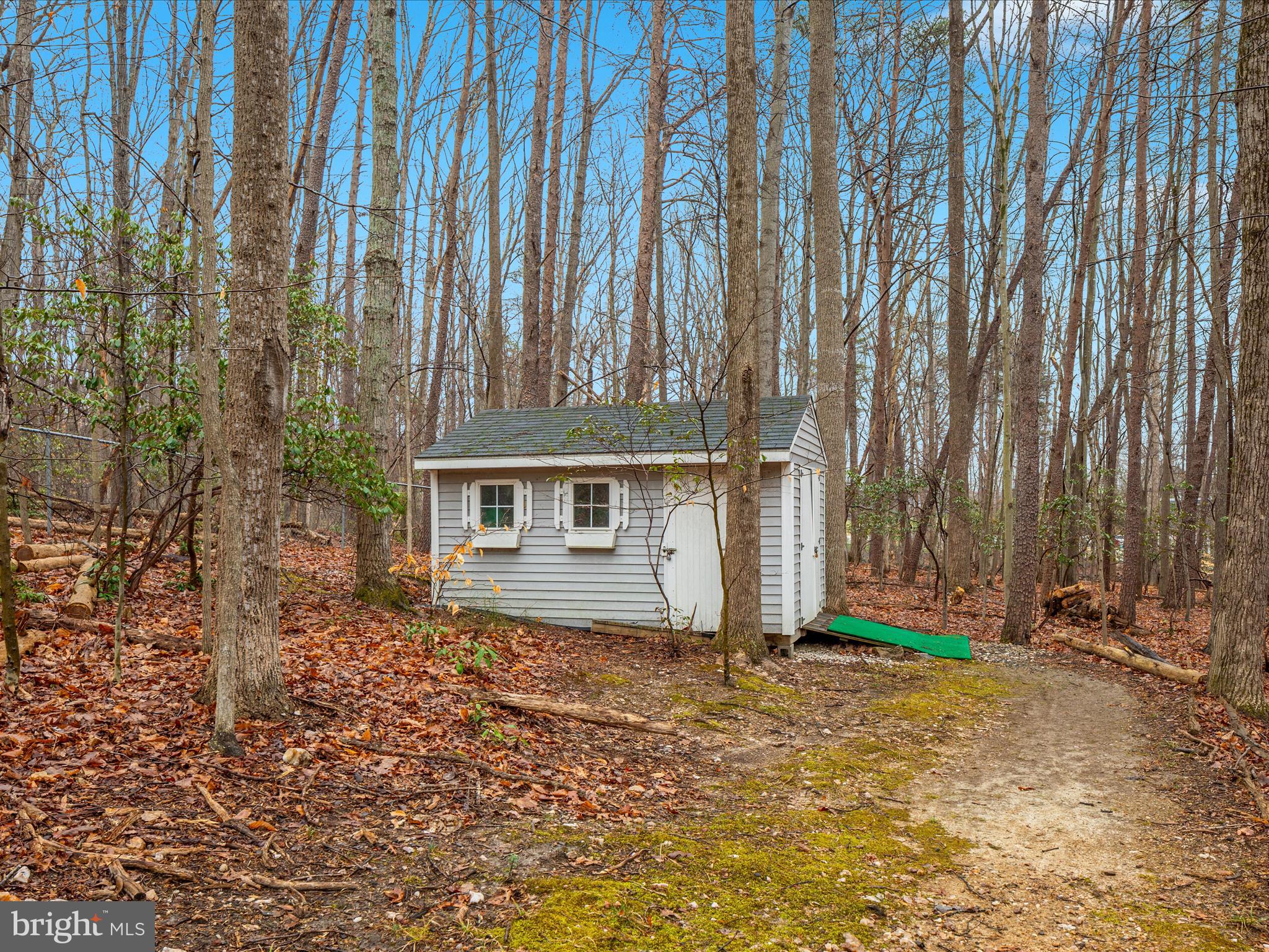 11701 Henderson Road Clifton, VA 20124 - Photo 43 of 61 a front view of a house with a yard