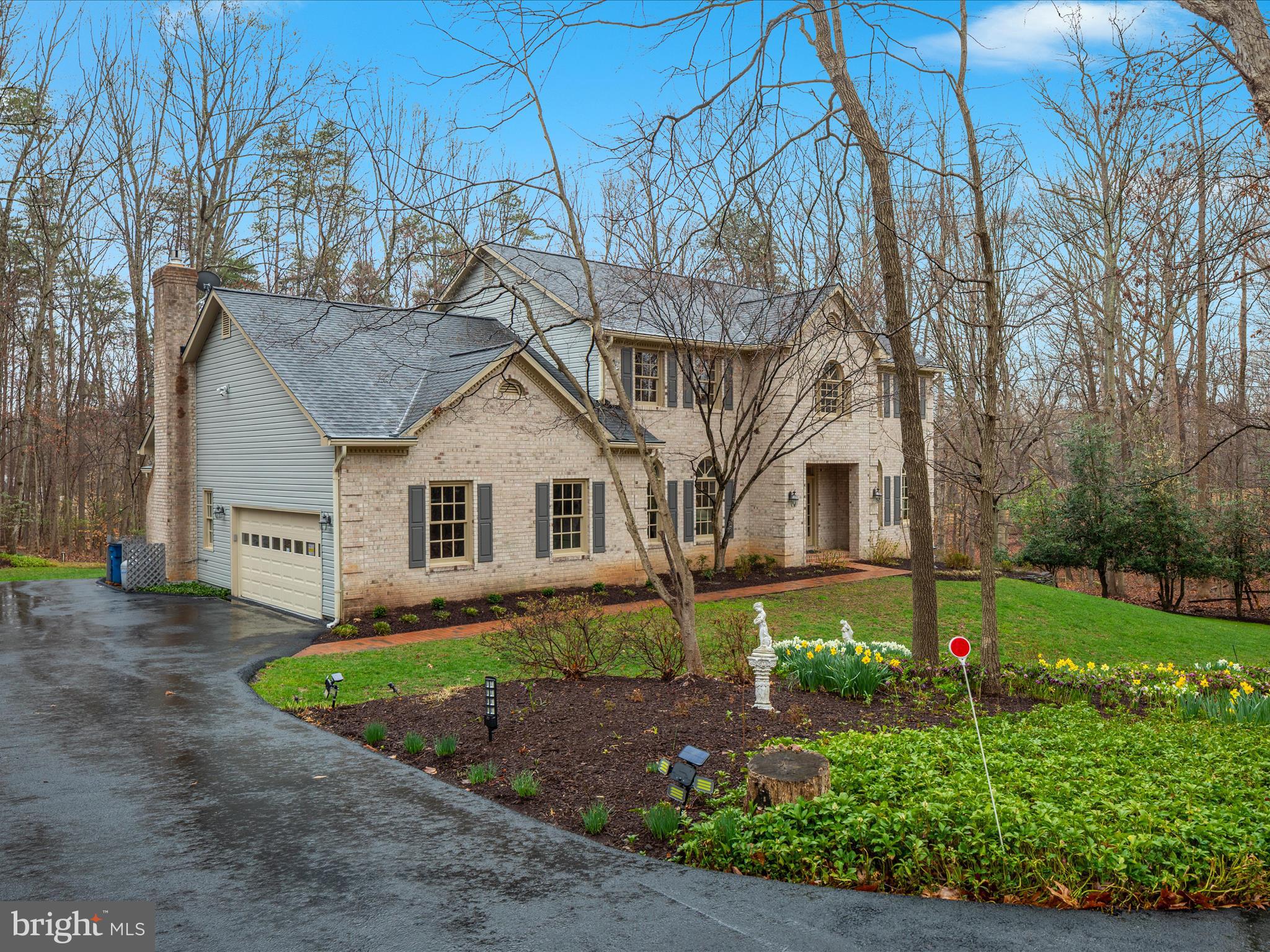 11701 Henderson Road Clifton, VA 20124 - Photo 44 of 61 a house that has a tree in it