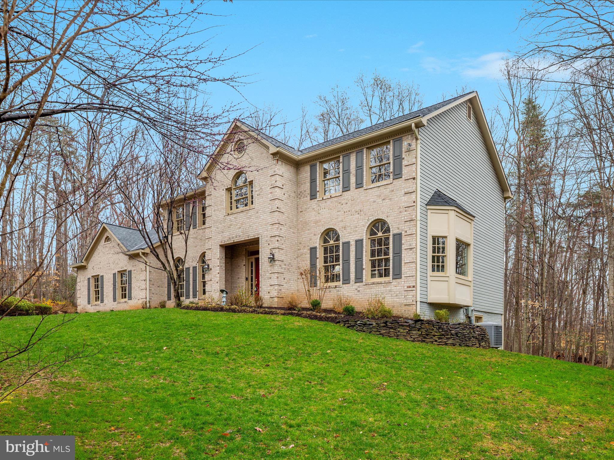 11701 Henderson Road Clifton, VA 20124 - Photo 45 of 61 a front view of a house with a yard