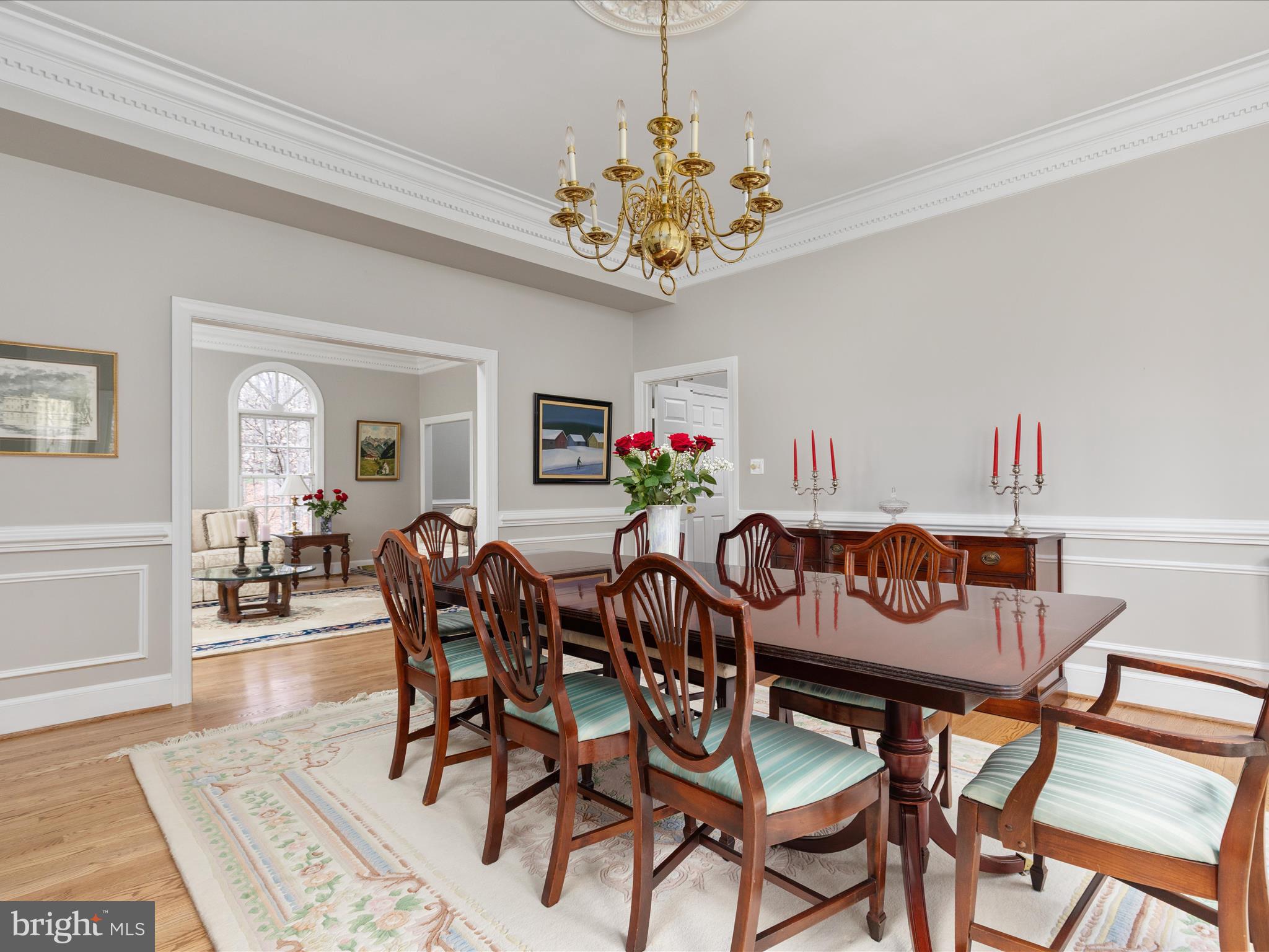11701 Henderson Road Clifton, VA 20124 - Photo 9 of 61 a view of a dining room with furniture wooden floor and chandelier