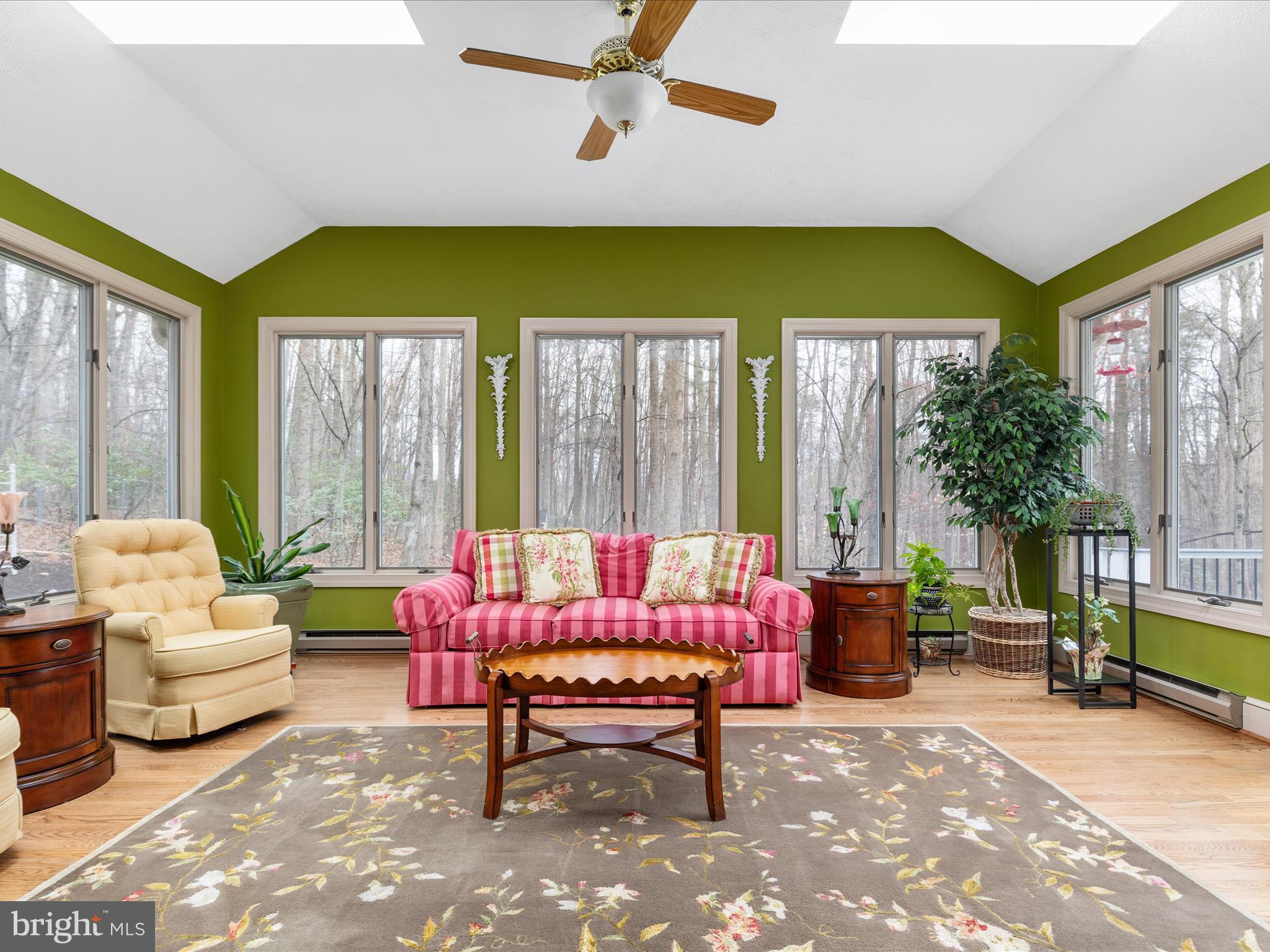 11701 Henderson Road Clifton, VA 20124 - Photo 10 of 61 a living room with furniture and a floor to ceiling window