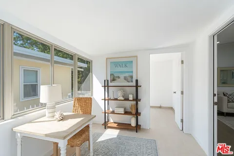 a spacious bathroom with a shower tub and sink