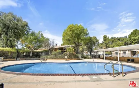 a view of outdoor space yard and swimming pool