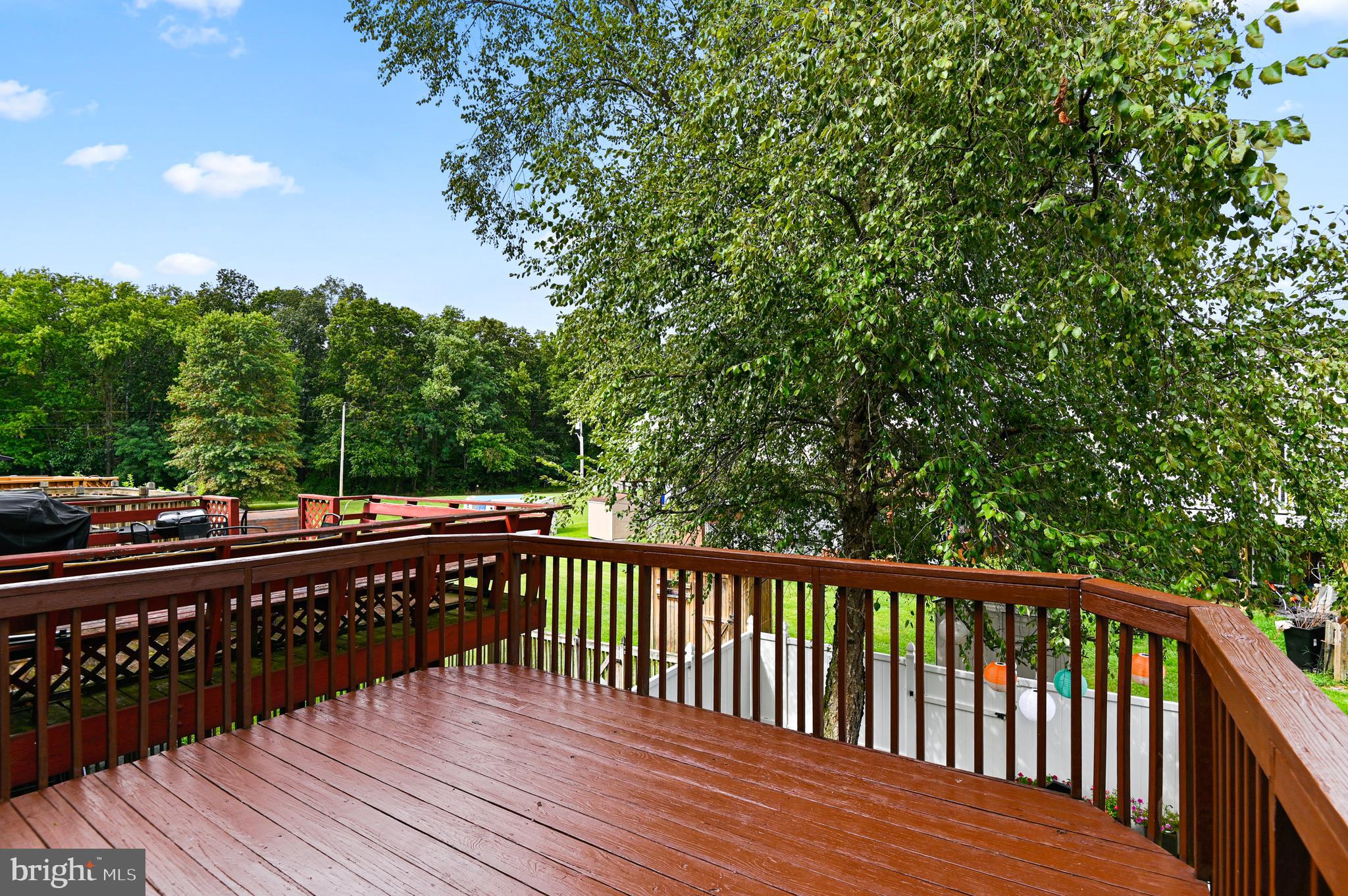422 Kosoak Road Baltimore, MD 21220 - Photo 13 of 37 Back Deck With View of Adjacent Woods