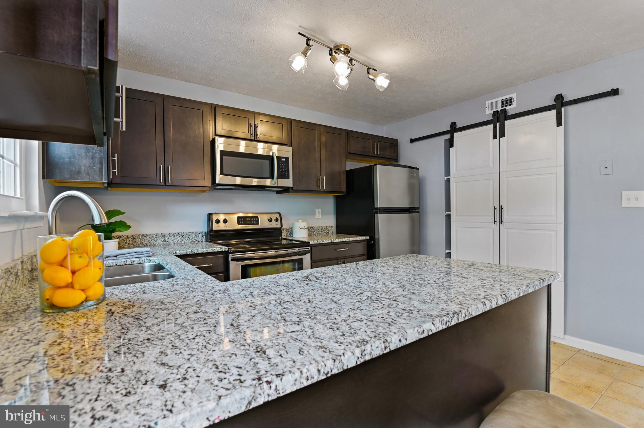 422 Kosoak Road Baltimore, MD 21220 - Photo 7 of 37 Kitchen with Pantry and New Cabinets and Granite