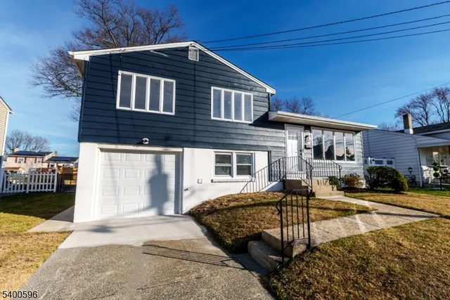 a front view of a house with swimming pool