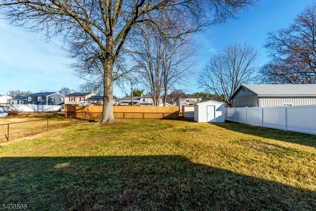 a view of a yard with a house