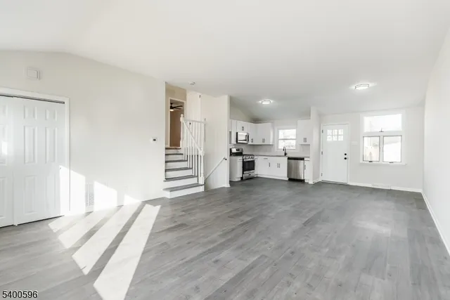 a view of kitchen and wooden floor