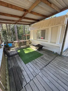 a view of swimming pool with a patio