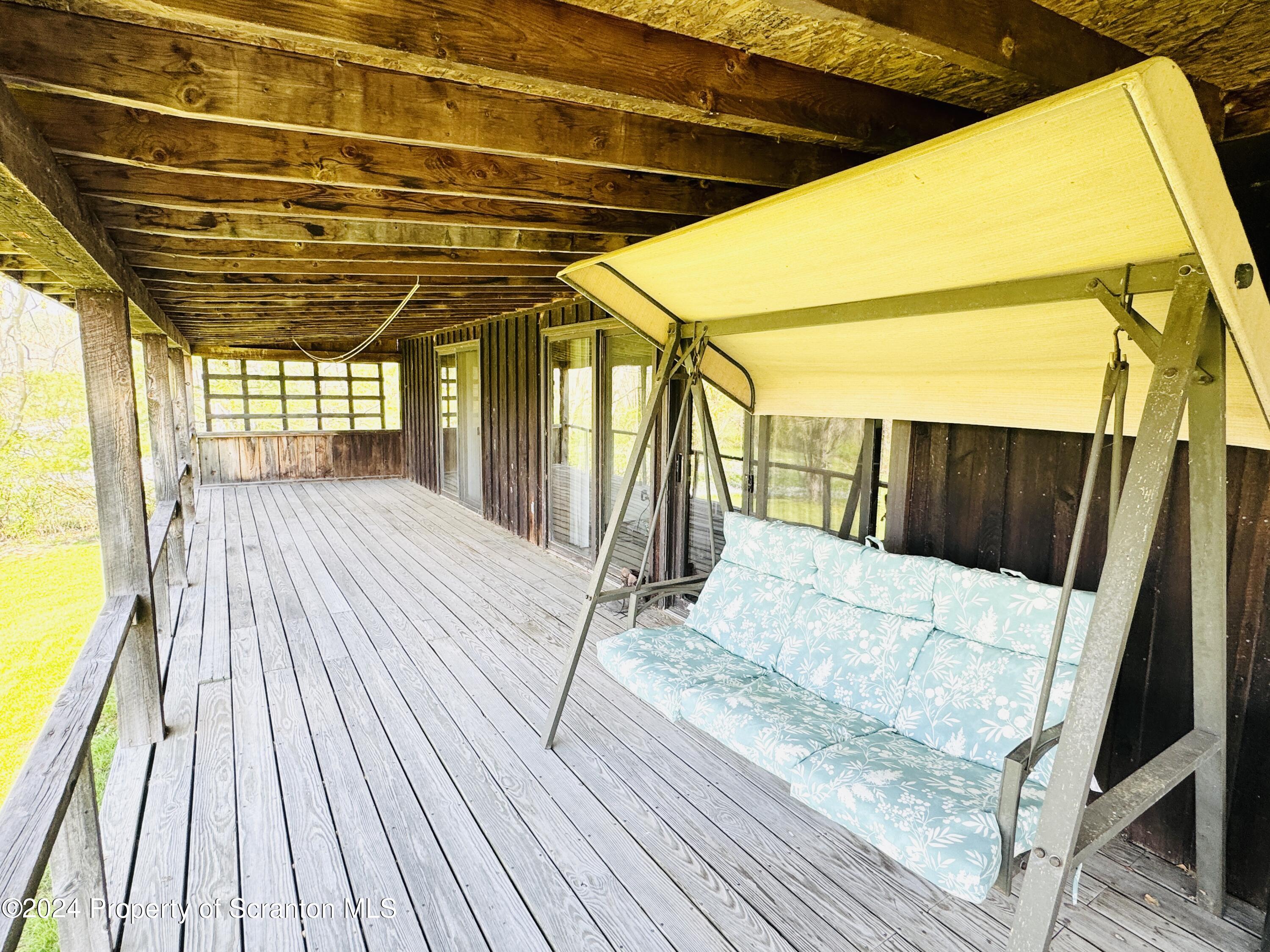 1590 State Rte 4002 Mehoopany, PA 18629 - Photo 22 of 38 a view of outdoor space with wooden deck