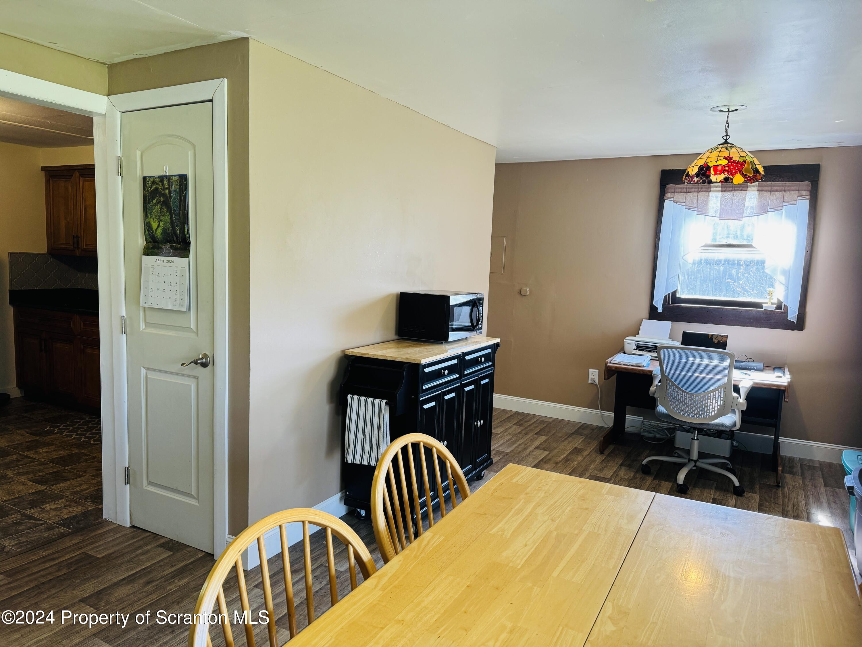 1590 State Rte 4002 Mehoopany, PA 18629 - Photo 9 of 38 a bedroom with a bed and a flat screen tv