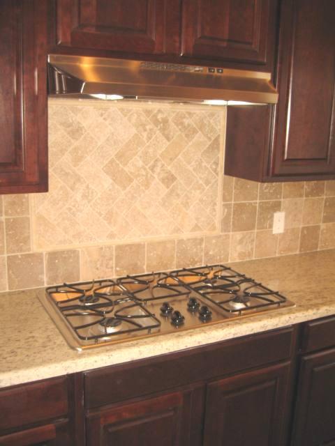 2851 East Blue Sage Road Gilbert, AZ 85297 - Photo 5 of 14 a stove top oven sitting inside of a kitchen
