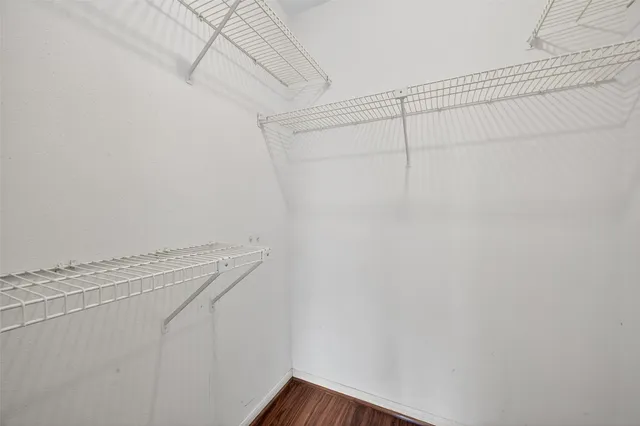 a view of a room with racks on the wall