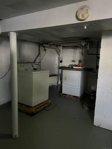a utility room with dryer and washer