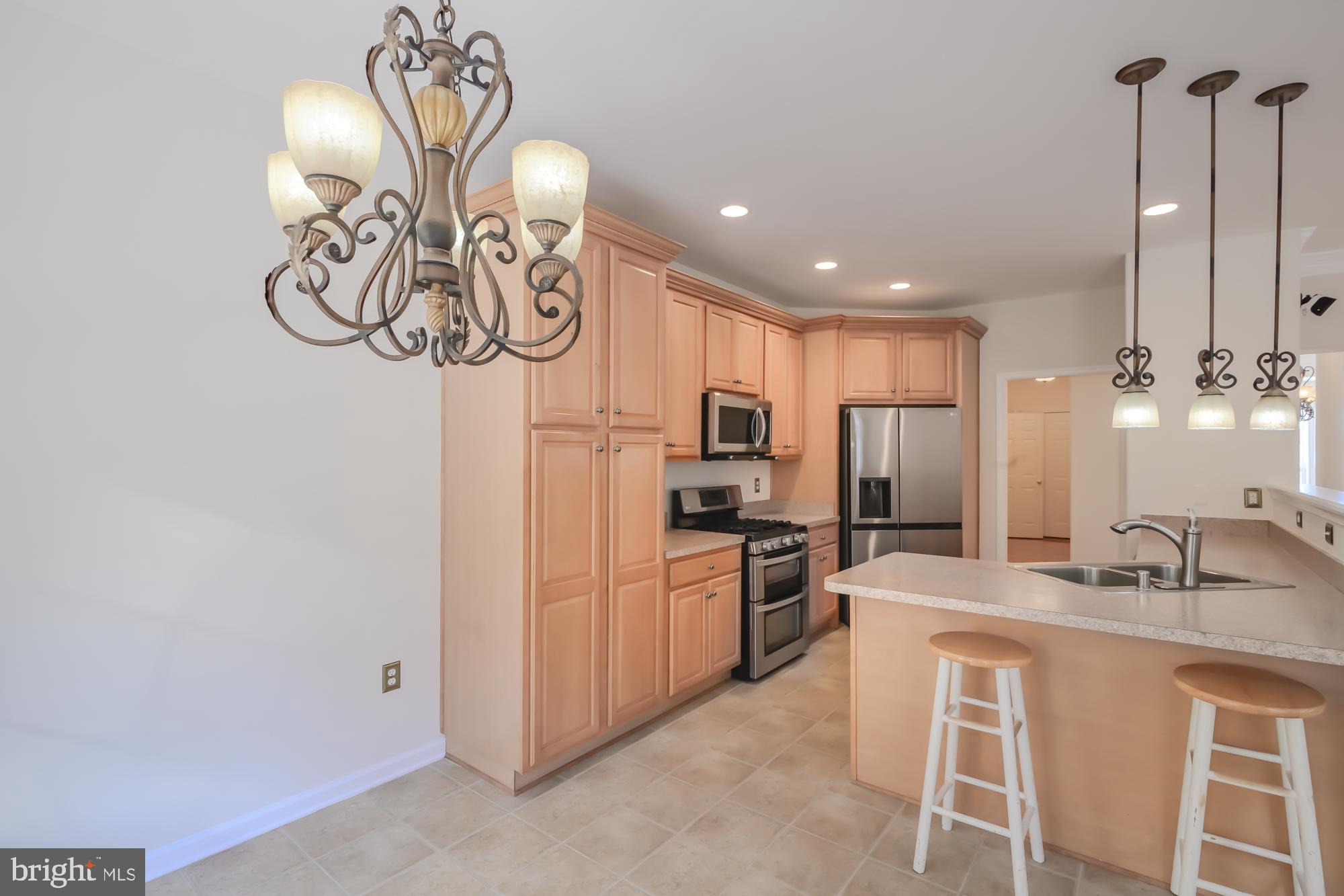 39 River Ridge Lane Fredericksburg, VA 22406 - Photo 15 of 94 Bright and inviting kitchen with modern charm.