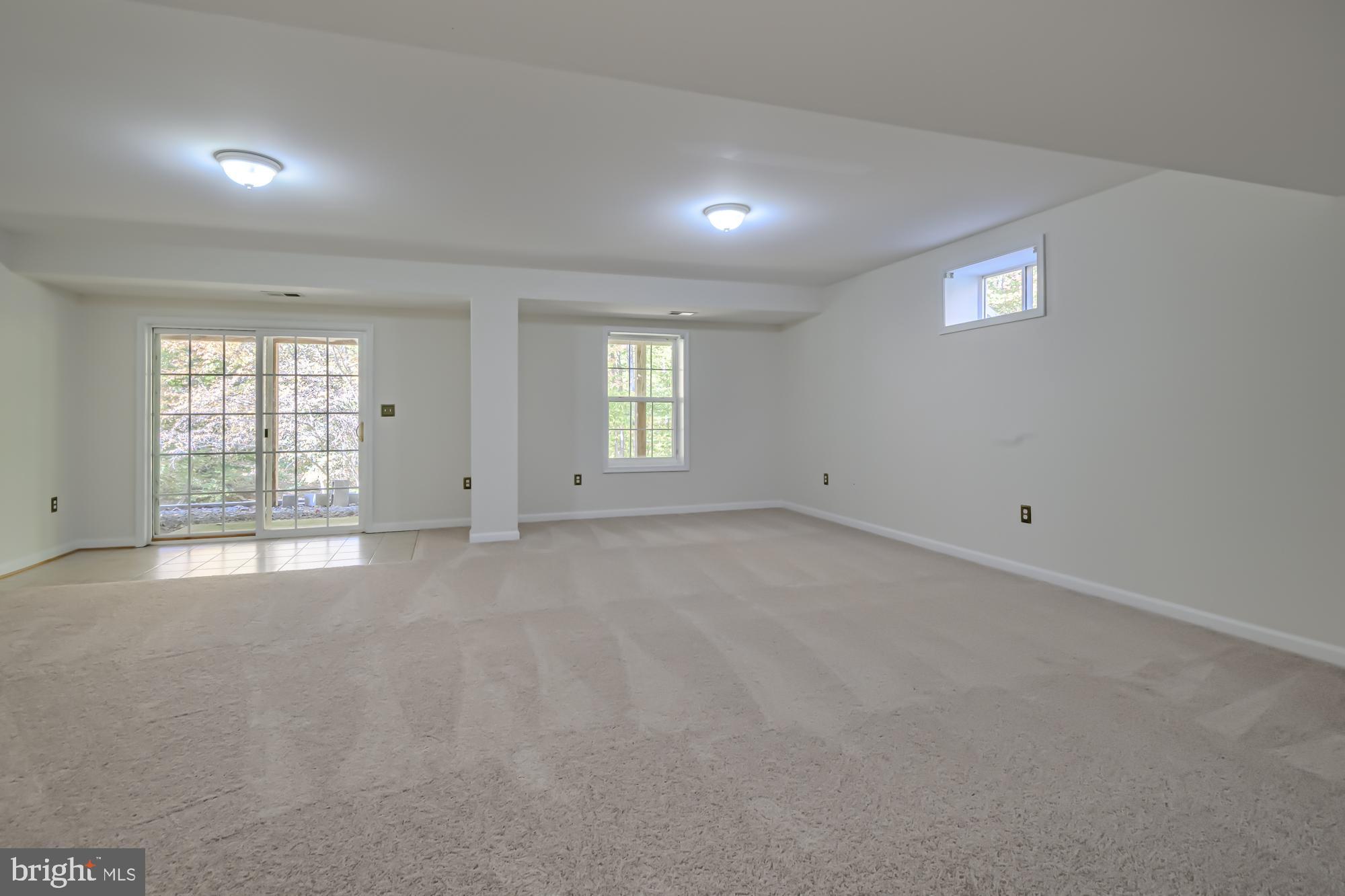 39 River Ridge Lane Fredericksburg, VA 22406 - Photo 54 of 94 Spacious, light-filled versatile living area.