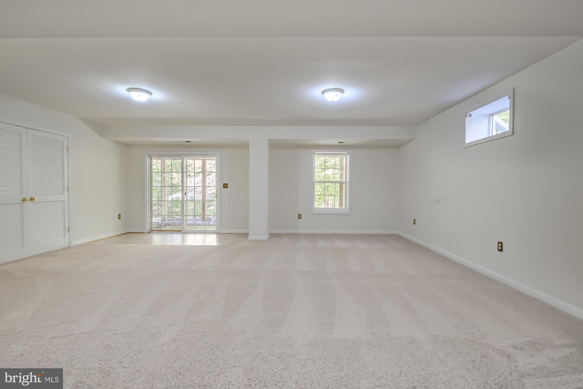 39 River Ridge Lane Fredericksburg, VA 22406 - Photo 55 of 94 Spacious, light-filled room with serene views.