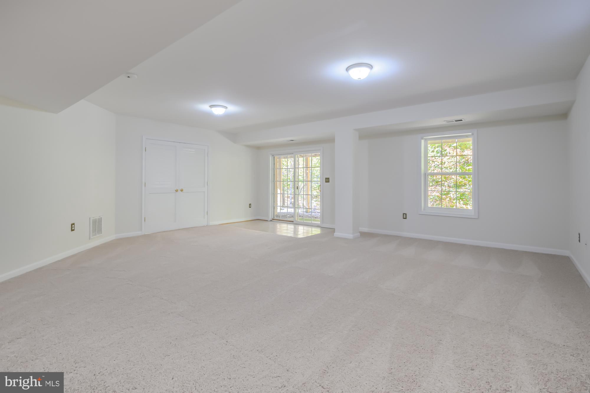 39 River Ridge Lane Fredericksburg, VA 22406 - Photo 56 of 94 Spacious, sunlit room with serene ambiance.