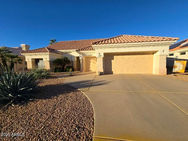 a view of a building with a street