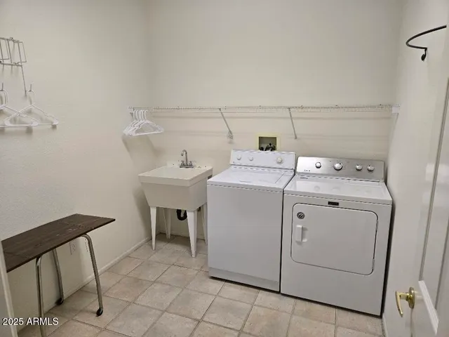 a dining room with furniture and windows