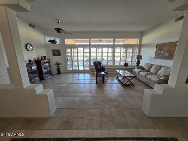 a room with furniture and a window