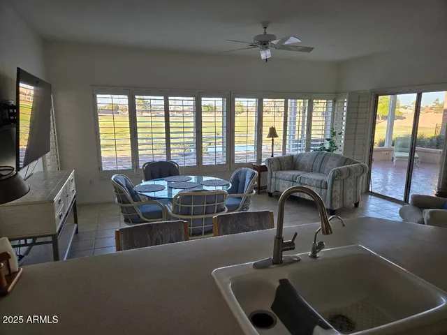 a living room with furniture and a window