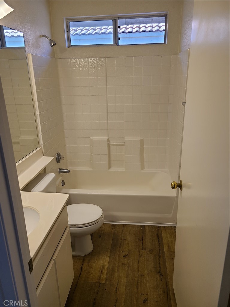 31975 Corte Algete Temecula, CA 92592 - Photo 13 of 15 a bathroom with a sink a toilet and shower