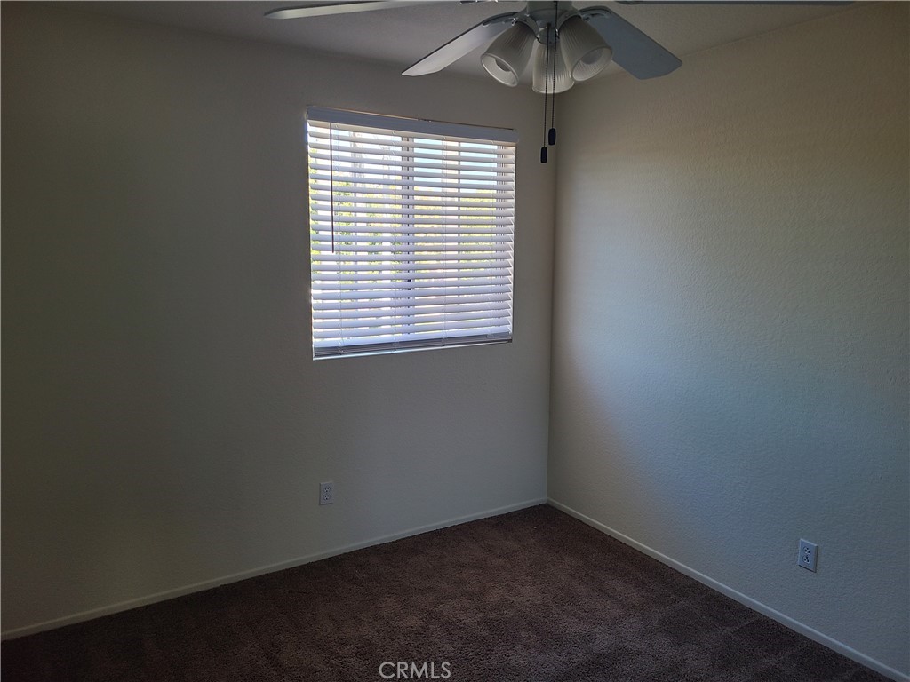 31975 Corte Algete Temecula, CA 92592 - Photo 10 of 15 an empty room with a window