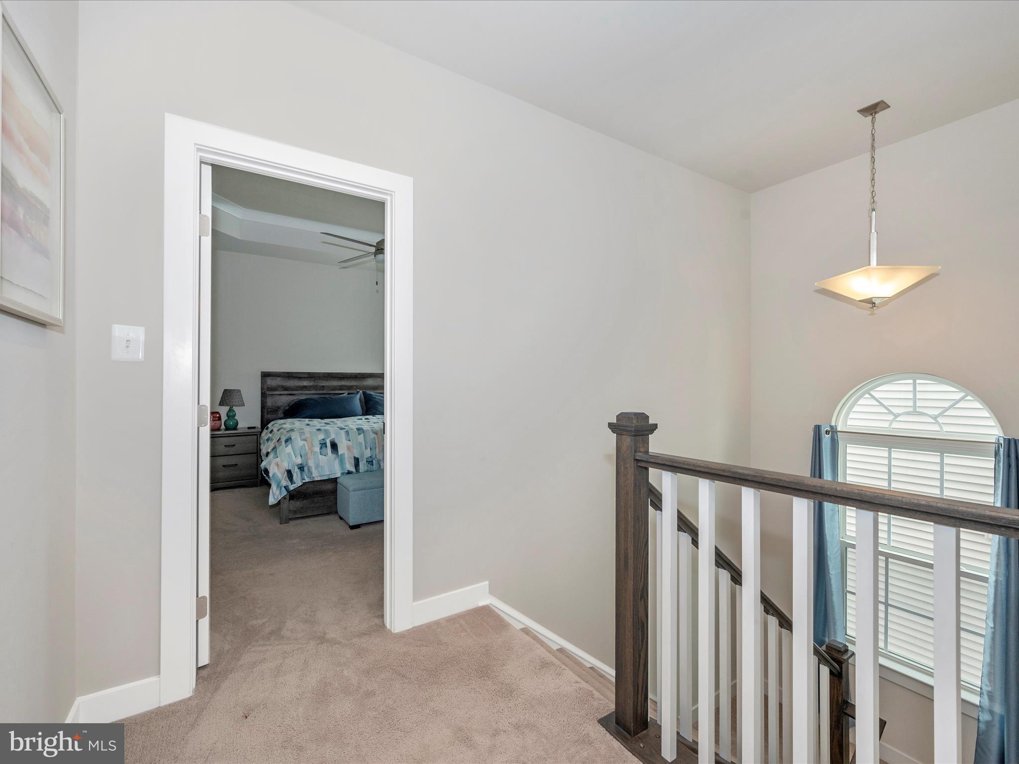 6649 Ballenger Run Boulevard Frederick, MD 21703 - Photo 17 of 42 a view of a bedroom with bed and furniture