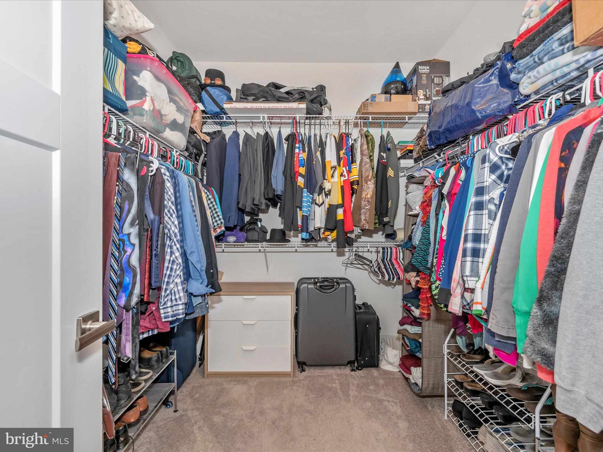 6649 Ballenger Run Boulevard Frederick, MD 21703 - Photo 20 of 42 a view of walk in closet with clothes