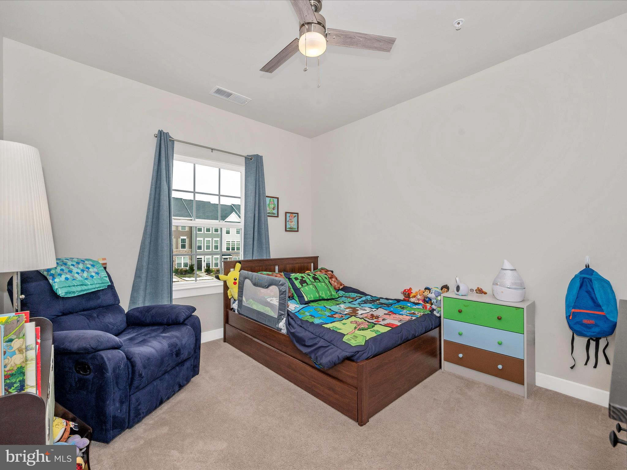 6649 Ballenger Run Boulevard Frederick, MD 21703 - Photo 23 of 42 a living room with furniture and a table