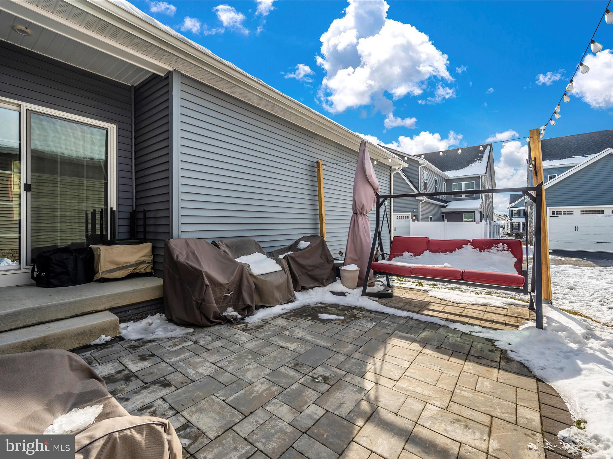 6649 Ballenger Run Boulevard Frederick, MD 21703 - Photo 36 of 42 a building outdoor space with patio furniture and potted plants