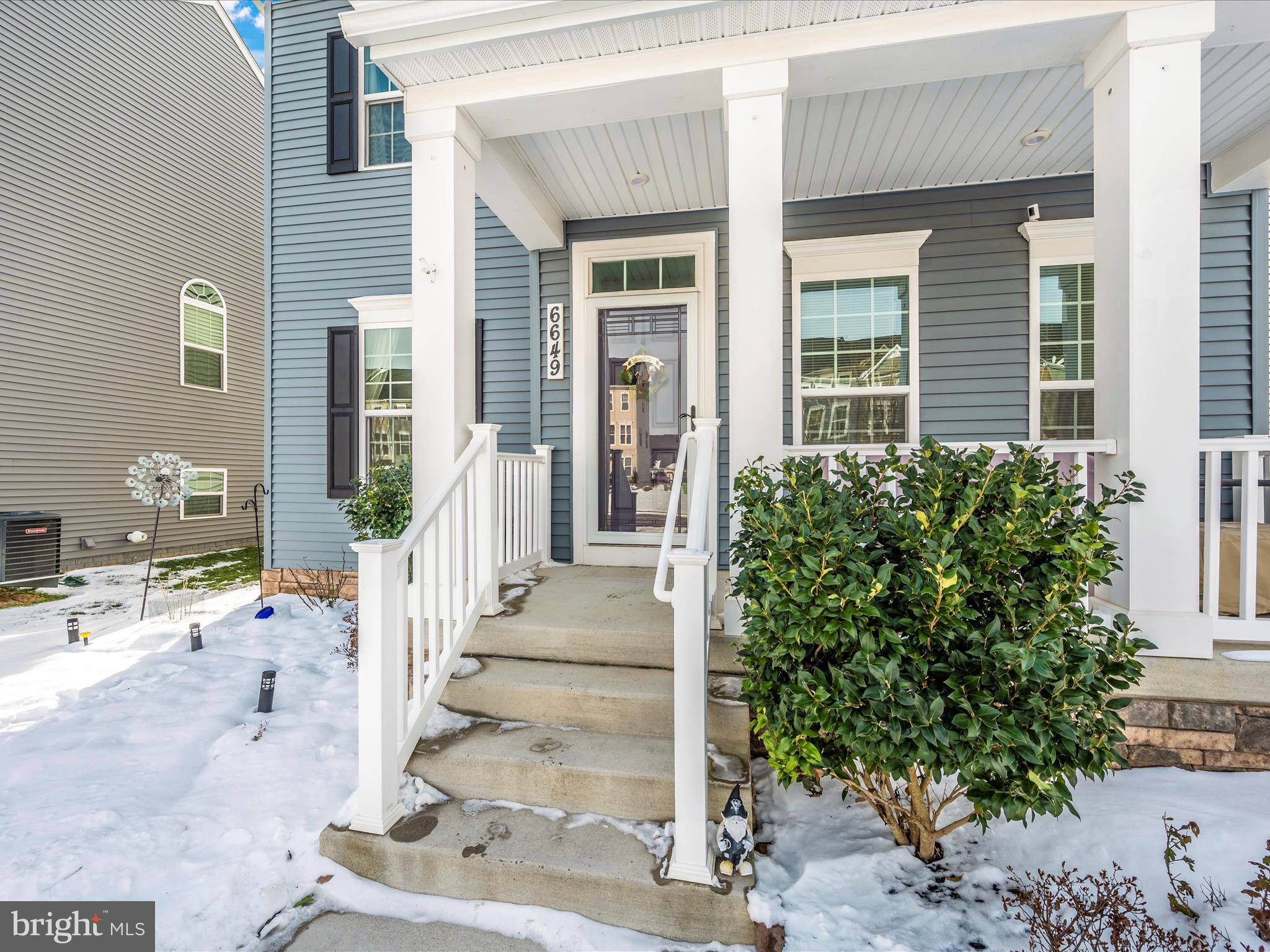 6649 Ballenger Run Boulevard Frederick, MD 21703 - Photo 37 of 42 a front view of a house with a porch