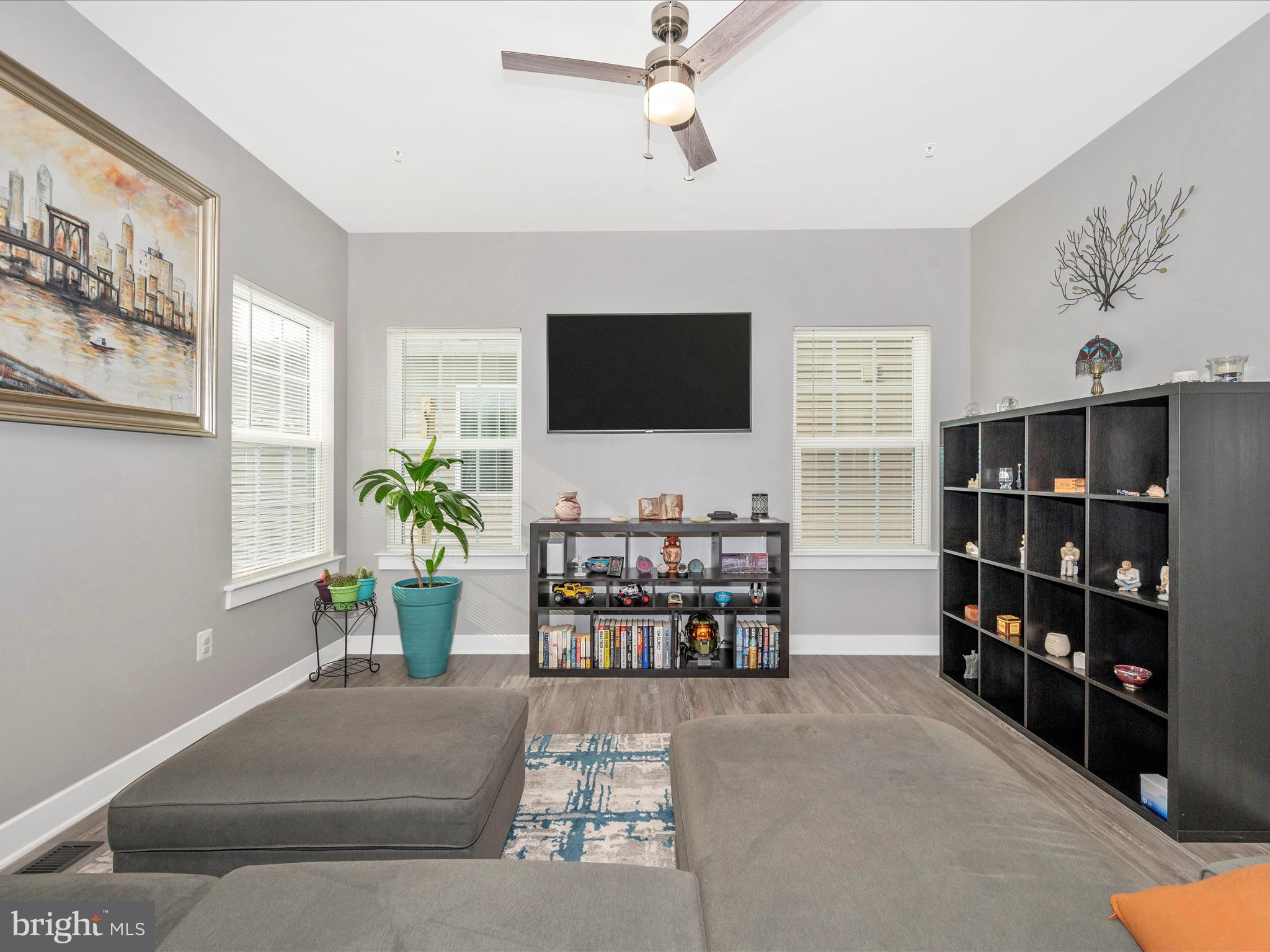 6649 Ballenger Run Boulevard Frederick, MD 21703 - Photo 4 of 42 a living room with furniture and a flat screen tv