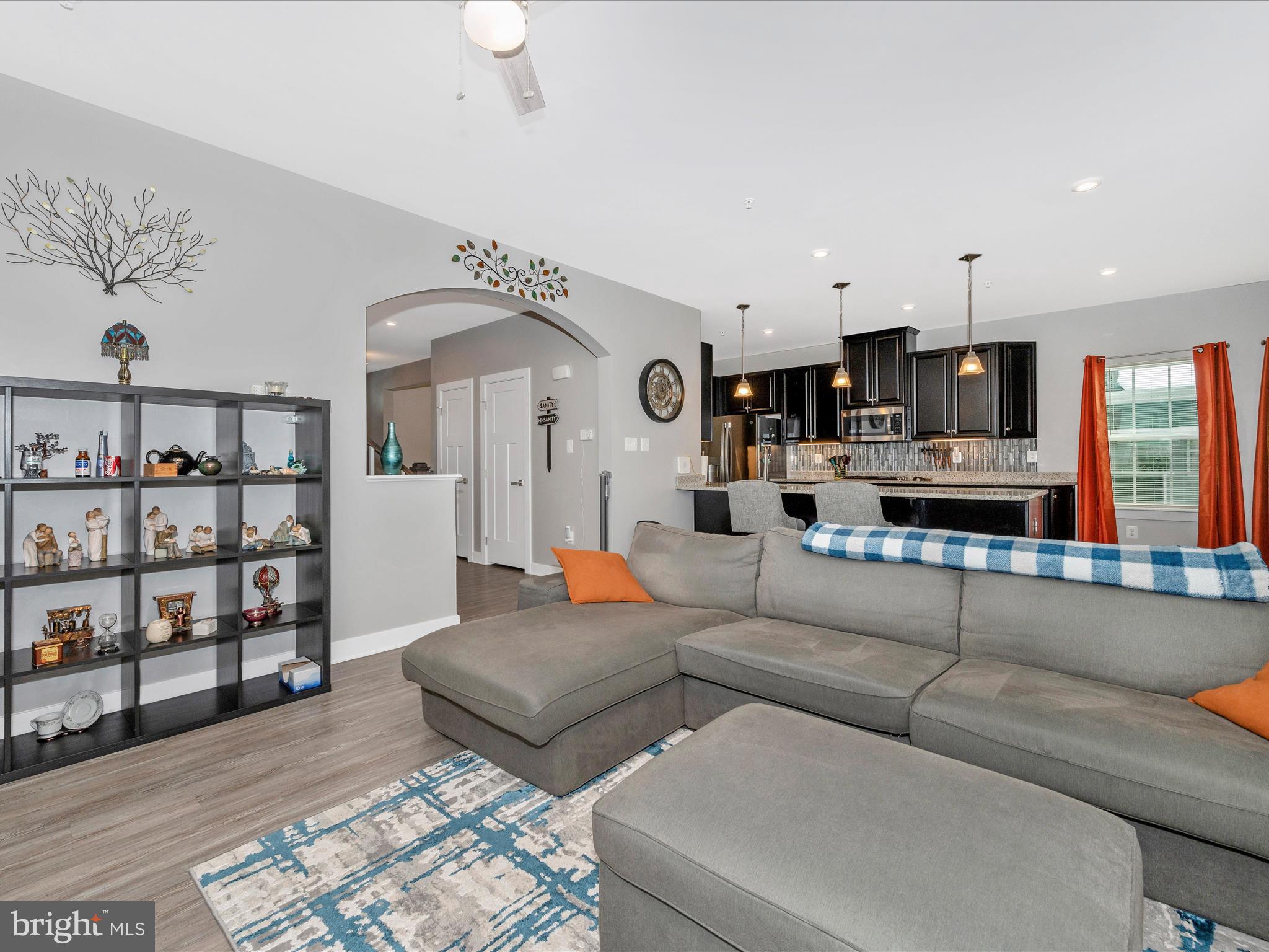 6649 Ballenger Run Boulevard Frederick, MD 21703 - Photo 5 of 42 a living room with furniture and a kitchen view