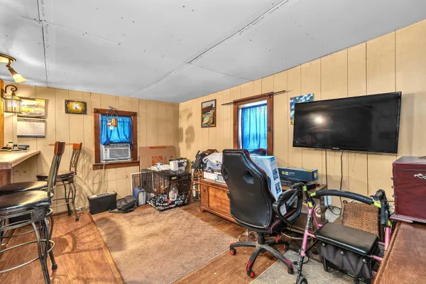 a view of entryway with wooden floor