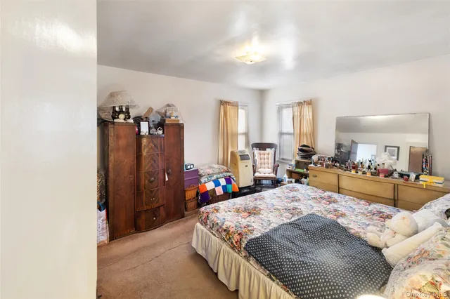 a bed room with a bed and a couch