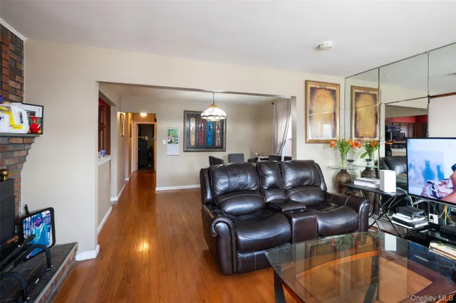 a lobby with furniture and wooden floor