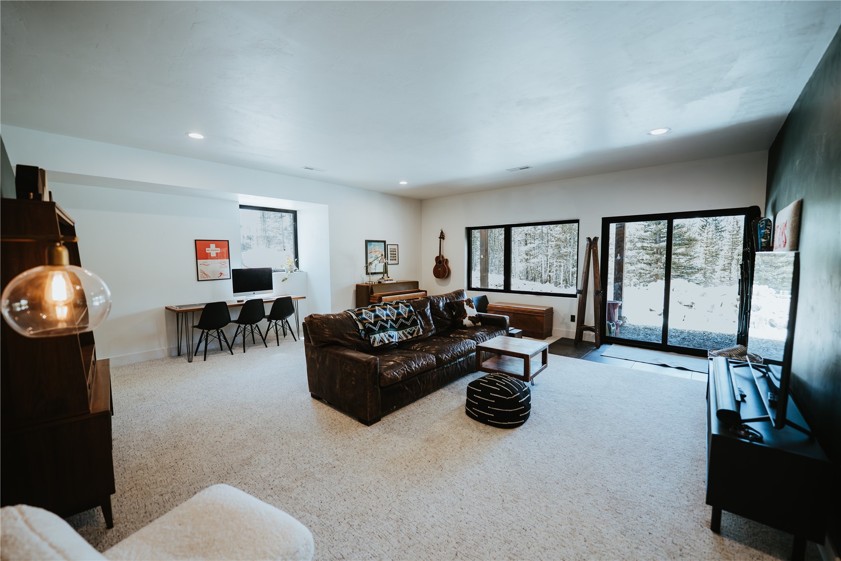 223 Guymard Road Fairplay, CO 80440 - Photo 25 of 49 a living room with furniture a large window and potted plant