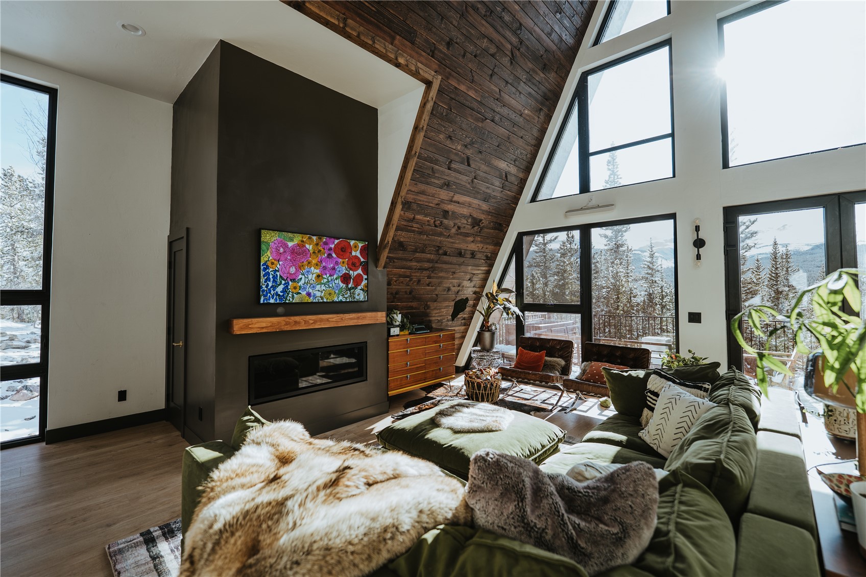 223 Guymard Road Fairplay, CO 80440 - Photo 45 of 49 a bedroom with furniture and a flat screen tv