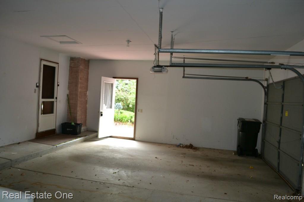 419 Lake Forest Road Rochester, MI 48309 - Photo 82 of 99 Interior 3-Car Attached Garage w/2 openers- Private entry to Garage in the rear.