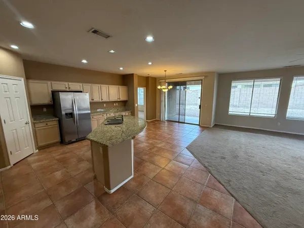 a view of a kitchen with a sink