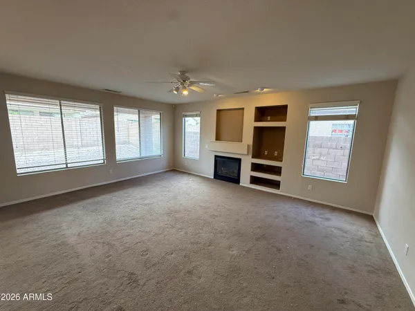 a view of livingroom with furniture and window