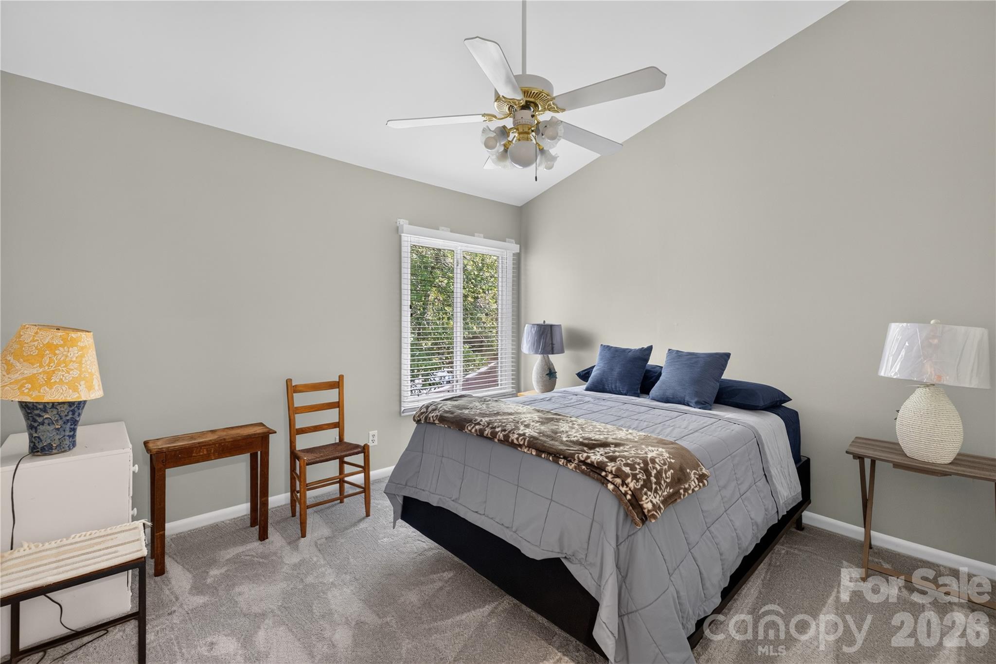 185 Riverview Terrace Clover, SC 29710 - Photo 13 of 35 a bedroom with a bed and a chandelier