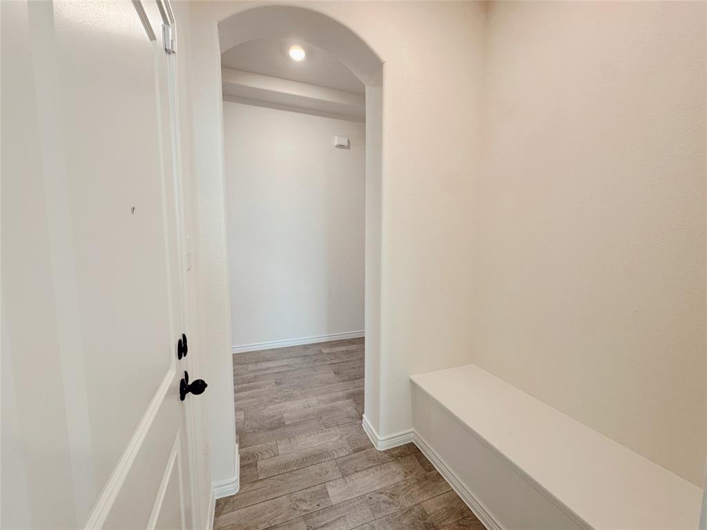 1076 Sublime Drive Forney, TX 75126 - Photo 11 of 40 a bathroom with a tub and shower