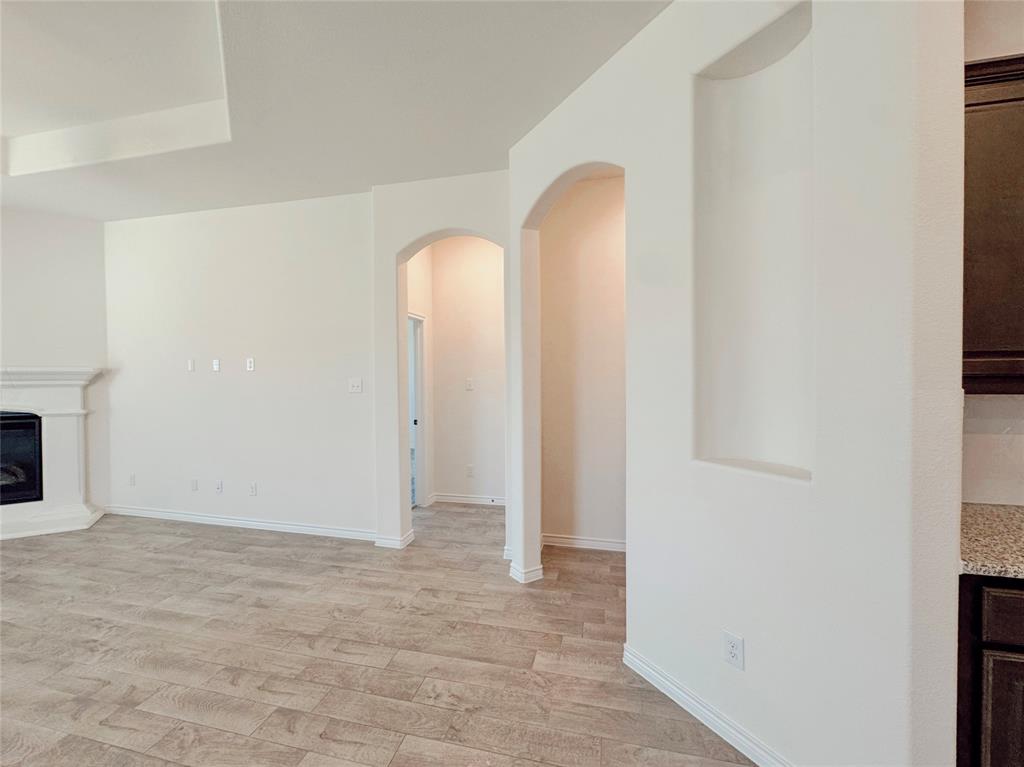 1076 Sublime Drive Forney, TX 75126 - Photo 24 of 40 an empty room with windows