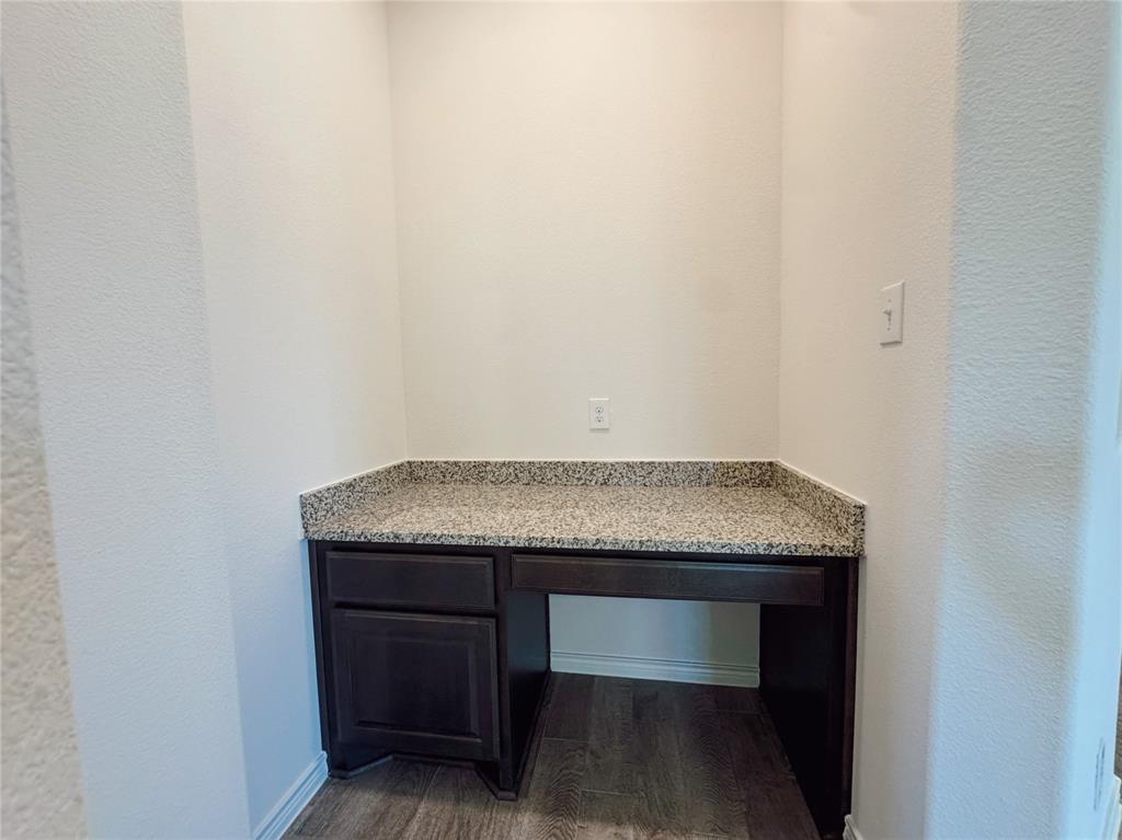 1076 Sublime Drive Forney, TX 75126 - Photo 25 of 40 a room with a sink and cabinets