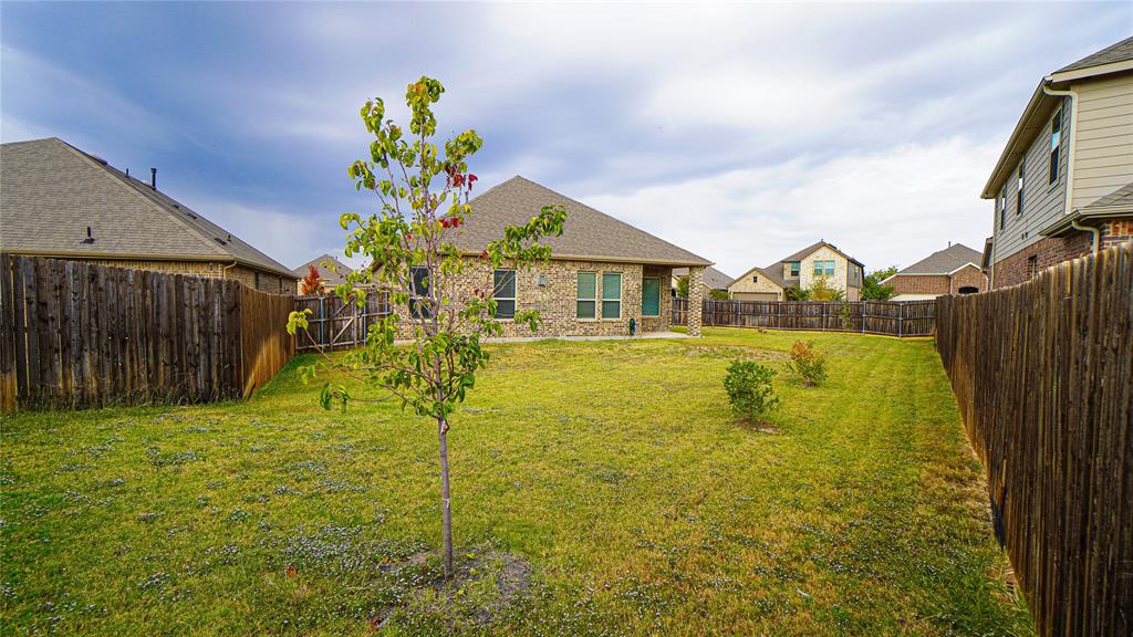 1076 Sublime Drive Forney, TX 75126 - Photo 34 of 40 a view of a house with a swimming pool