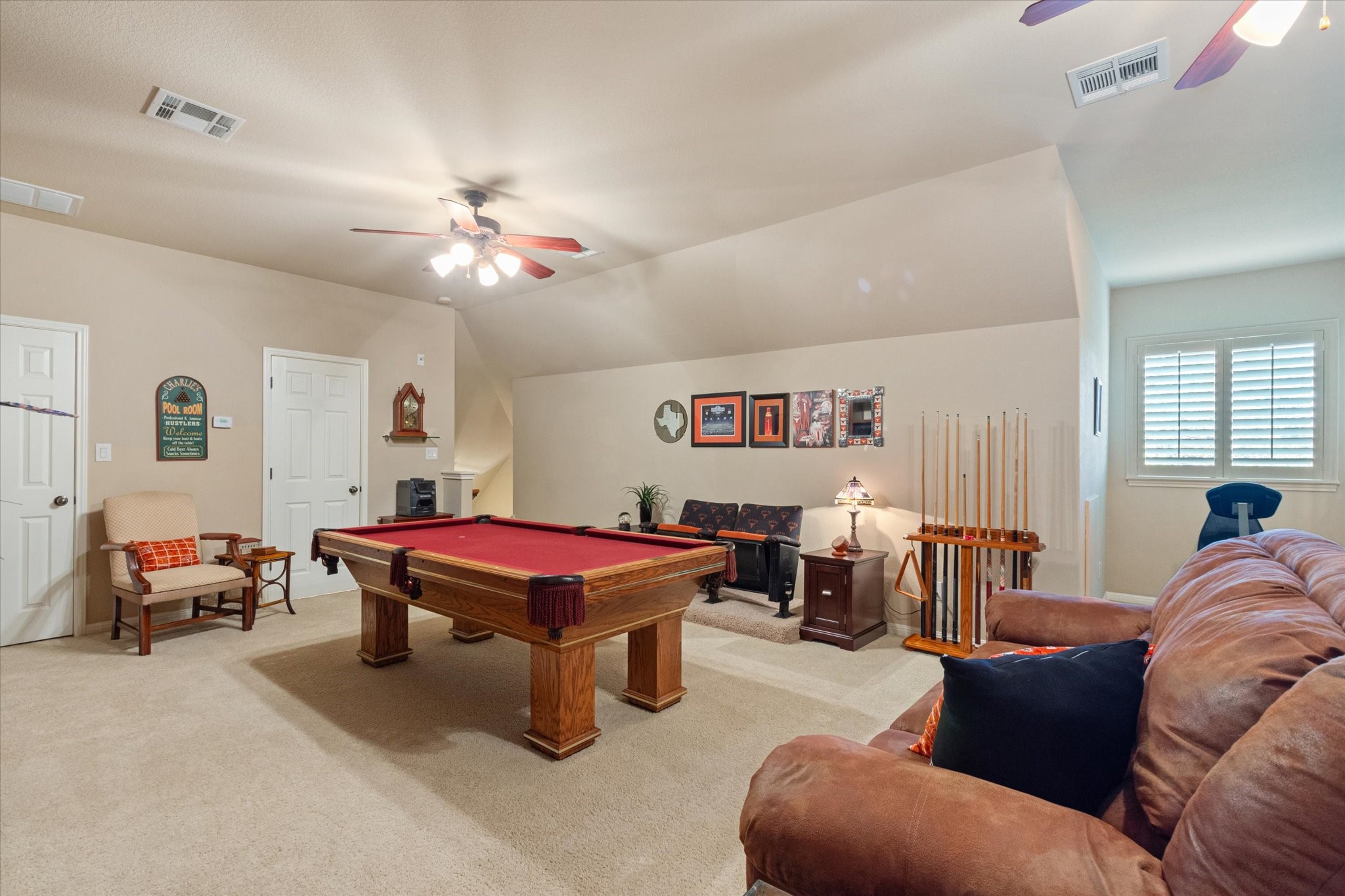 5421 Cypress Ranch Boulevard Spicewood, TX 78669 - Photo 28 of 42 a living room with furniture and a chandelier